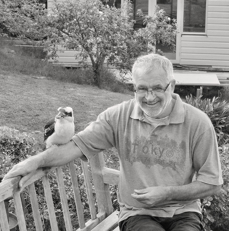 Peter Baron in the garden with a kookaburra